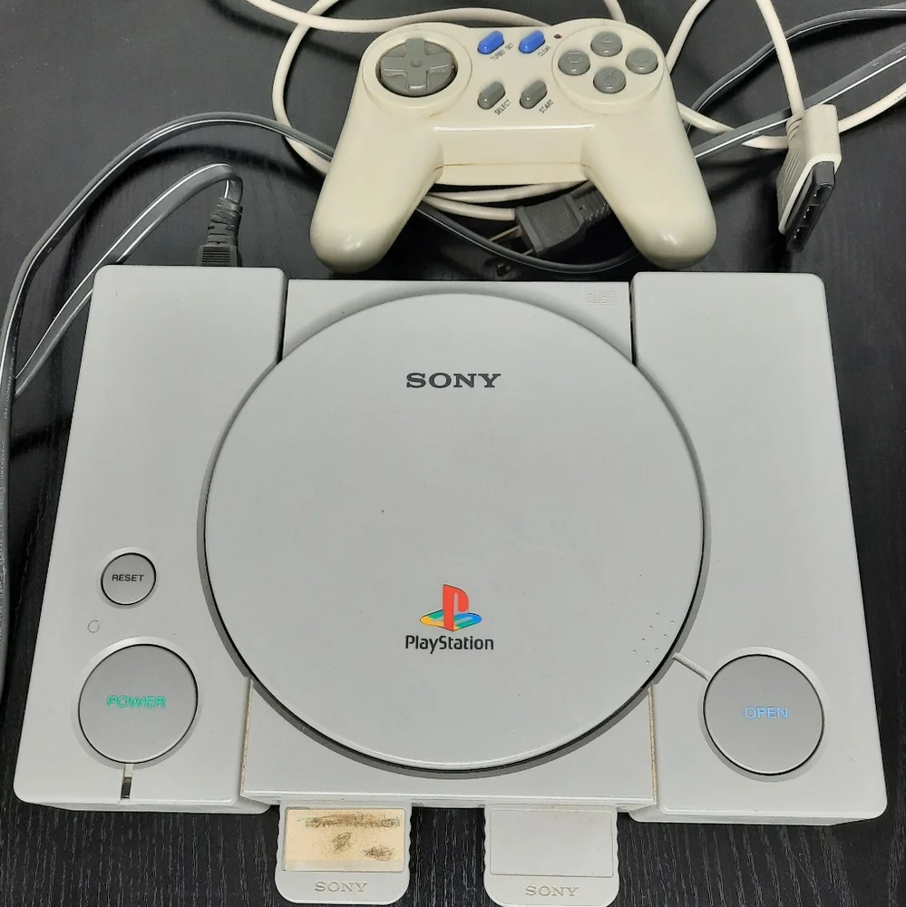 Playstation 1 Console with 2 memory cards and a controller